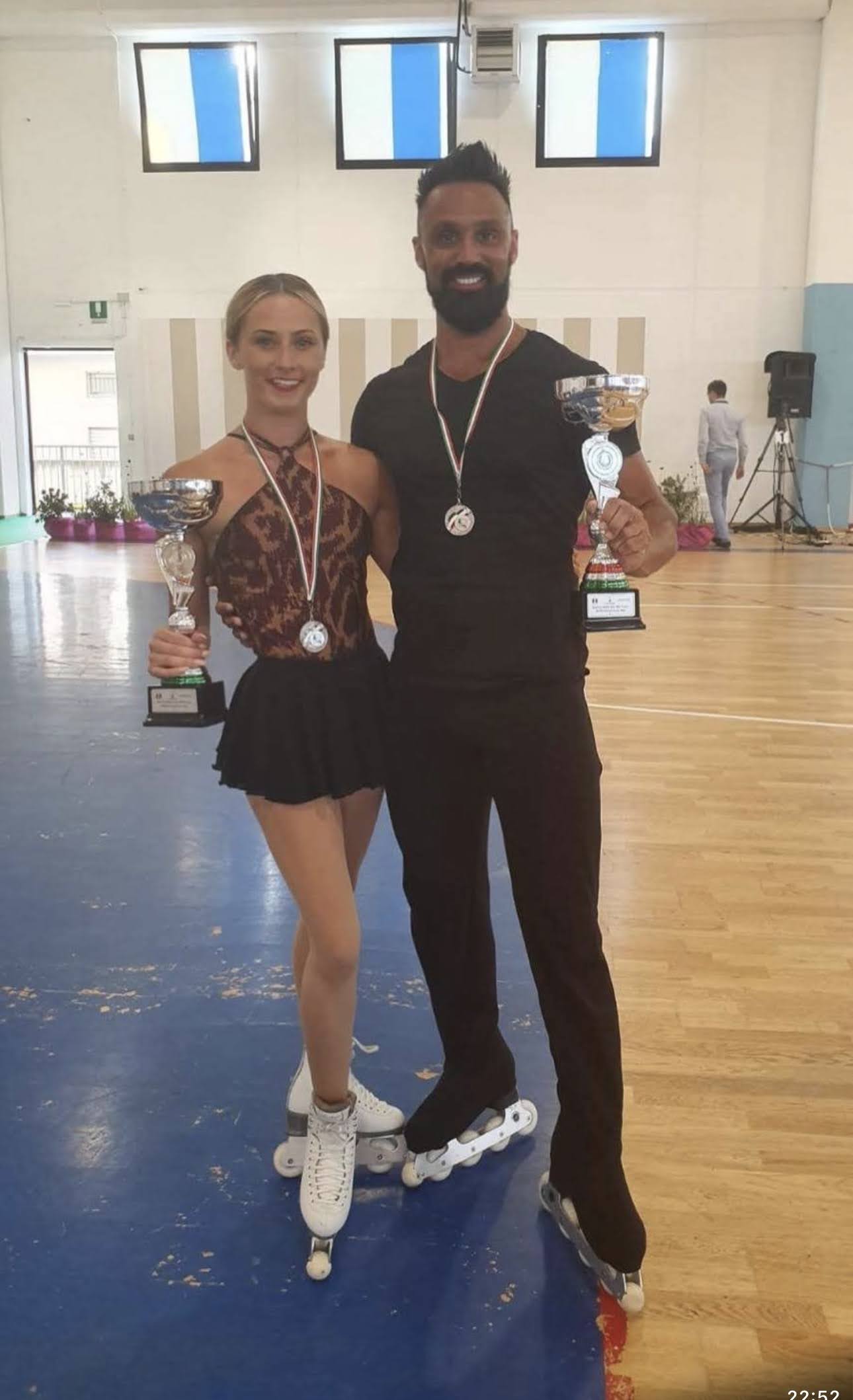 Rosie and Adam with their world championship trophy